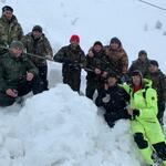 Борис на фотографии в красной шапке